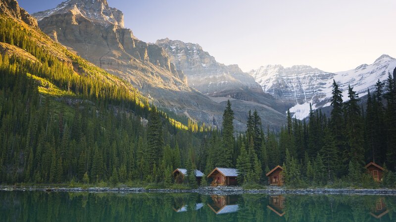 Mountain cabins by a lake