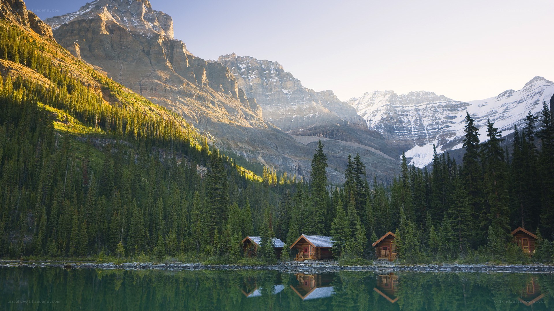 Mountain cabins by a lake