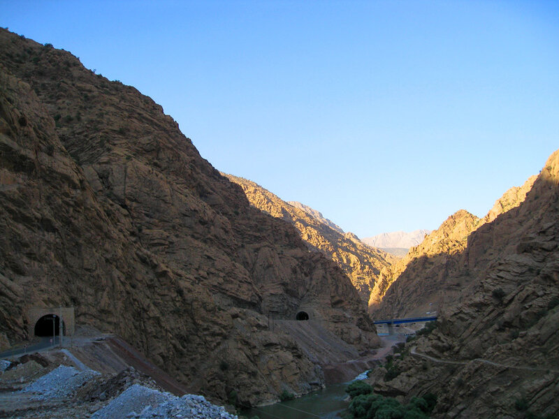Mountain canyon with tunnels and river