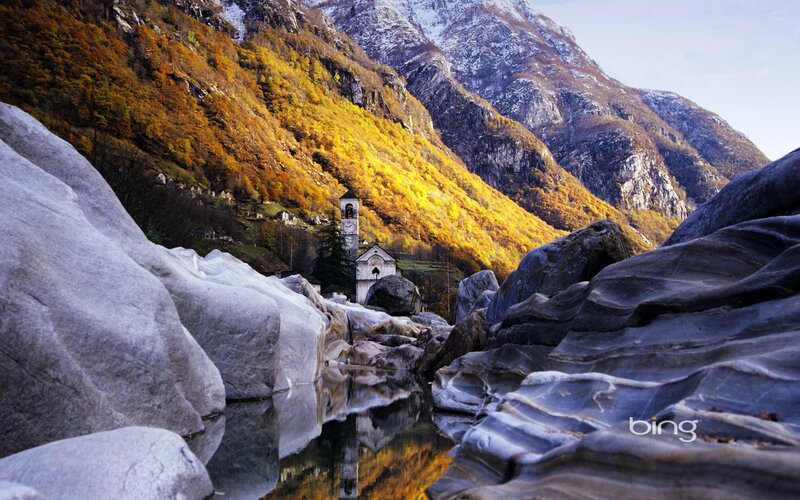 Mountain church in autumn valley
