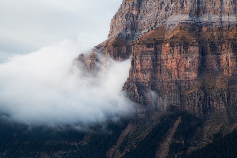 Mountain Cliff with Clouds