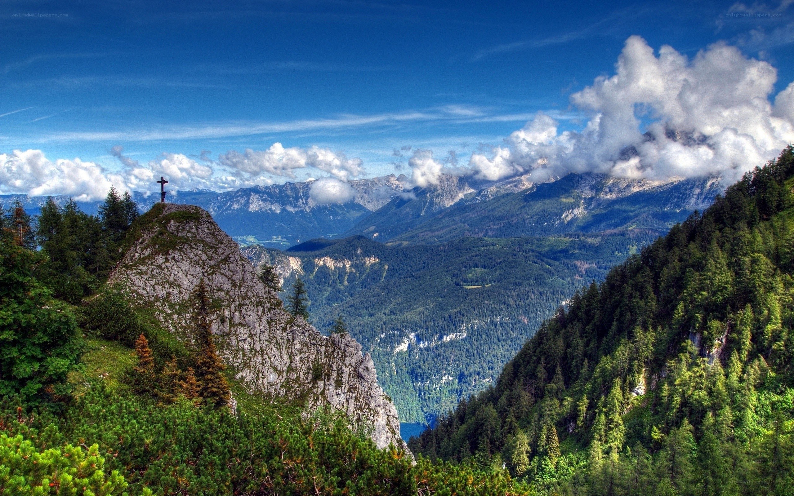 Mountain cross overlooking valley