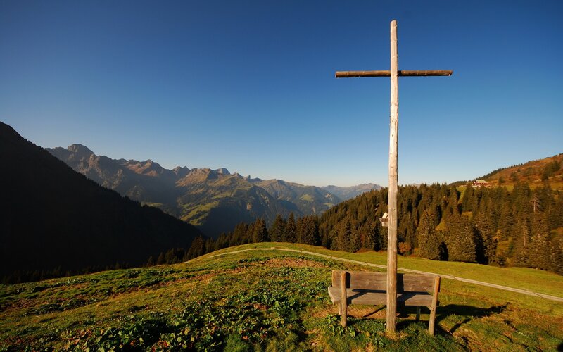 Mountain cross with scenic view