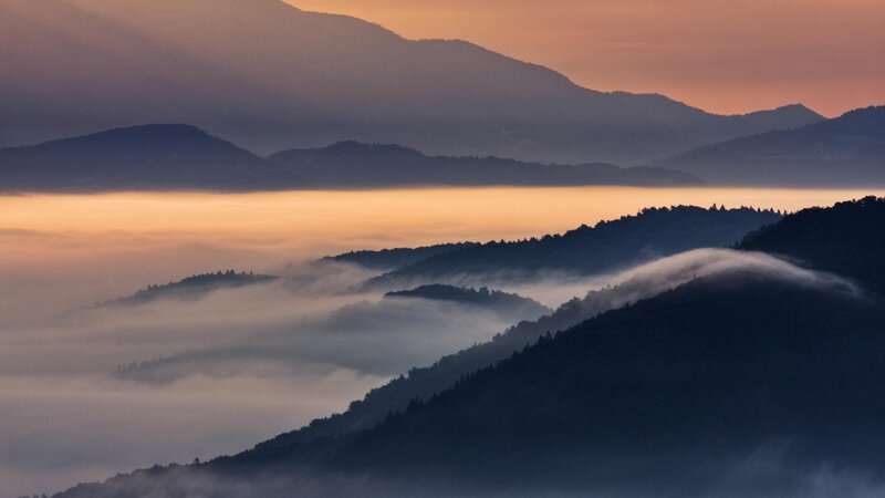 Mountain fog at sunrise