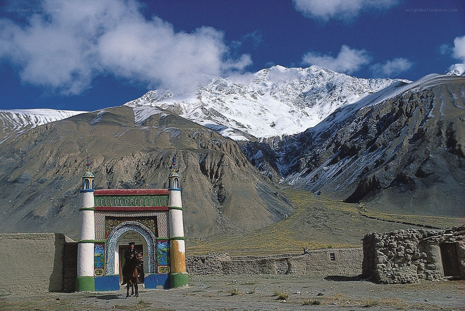 Mountain gateway with rider