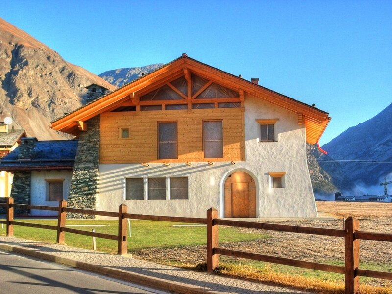 Mountain house with wooden facade