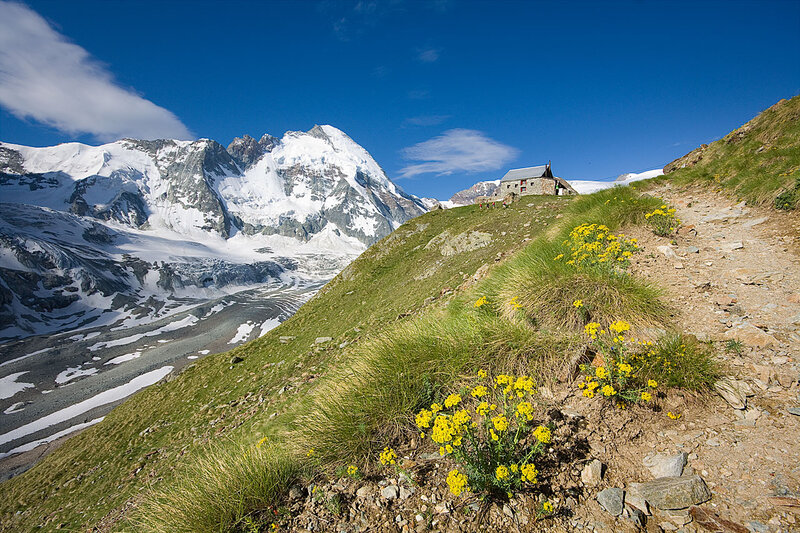 Mountain Hut in Alpine Landscape — Blue