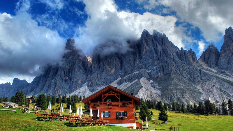 Mountain Hut in Alpine Meadow — Green, Dramatic, Afternoon