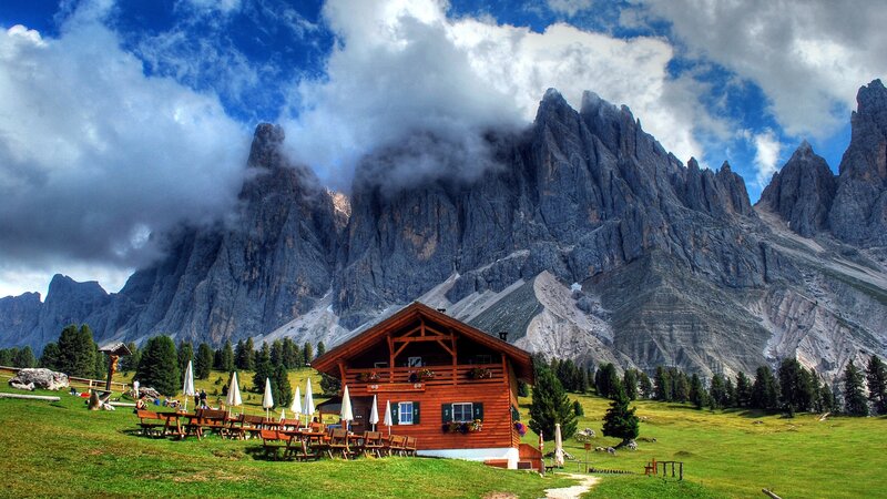 Mountain Hut in Alpine Meadow