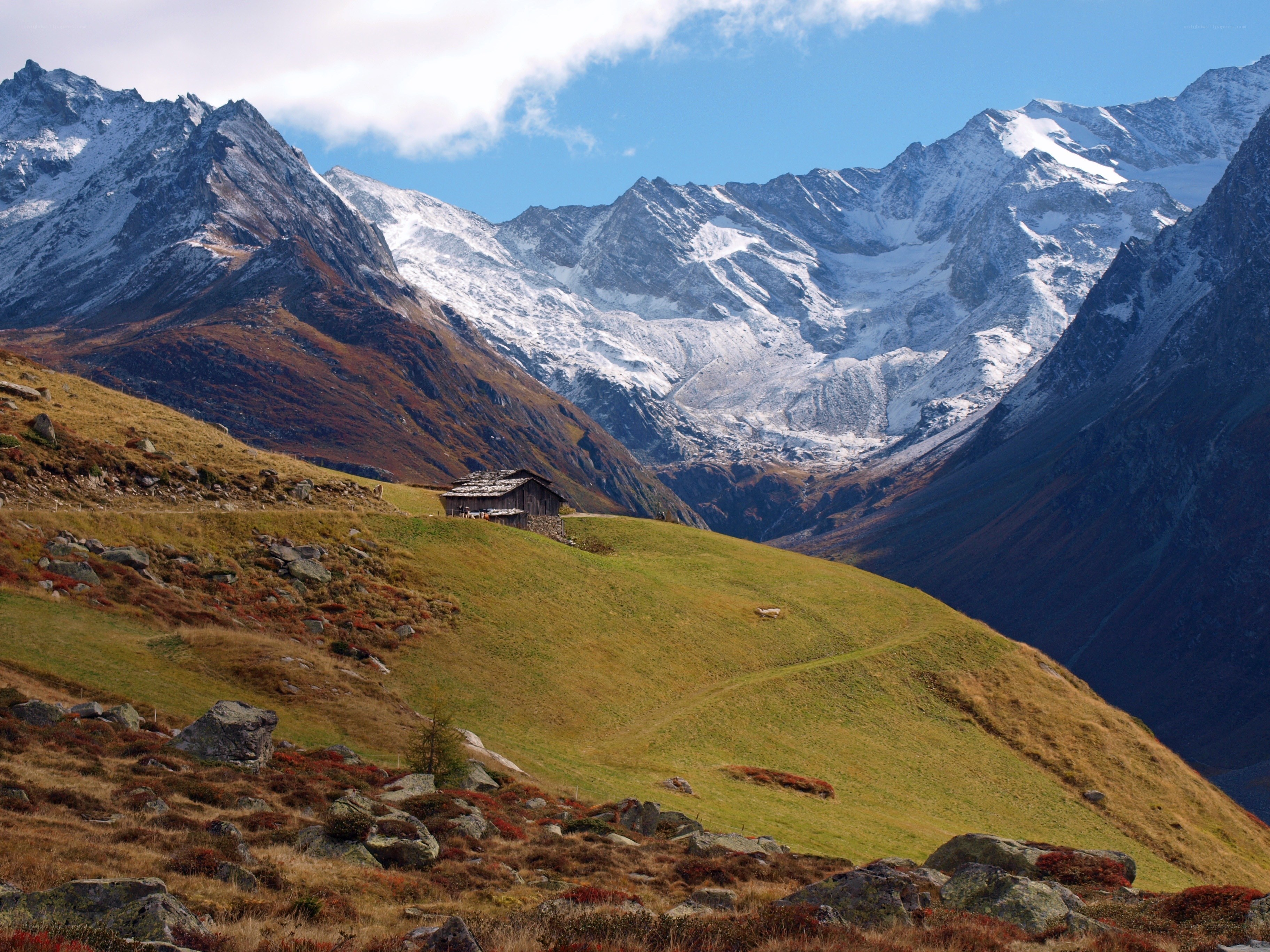 Mountain hut in alpine valley