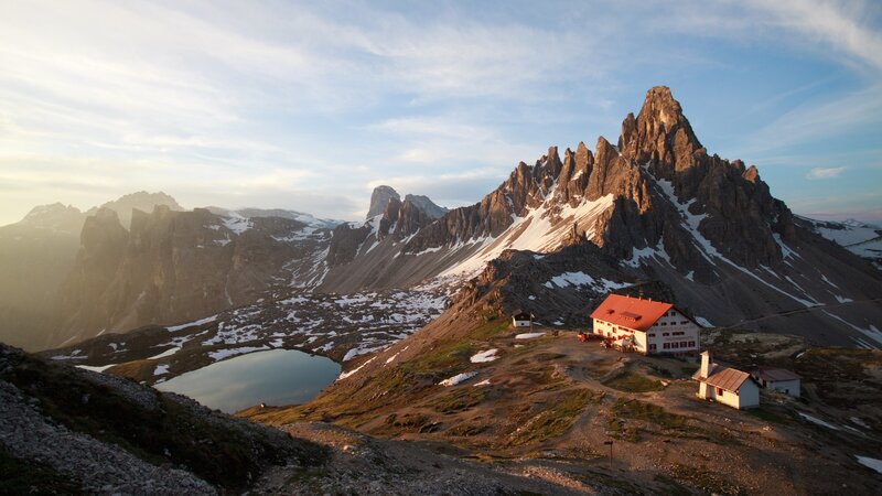 Mountain Hut in Alpine Valley — Blue
