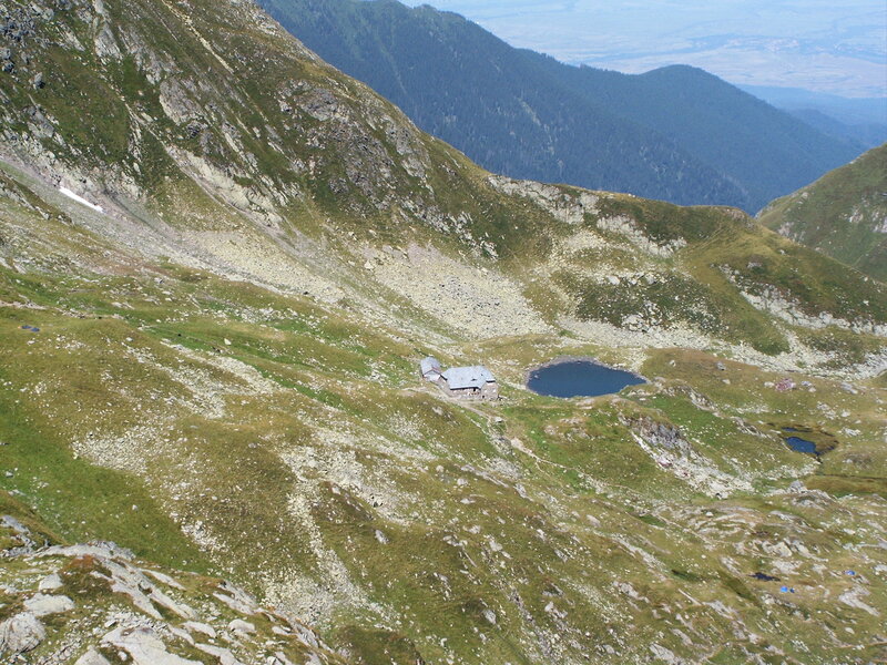 Mountain hut near alpine lake