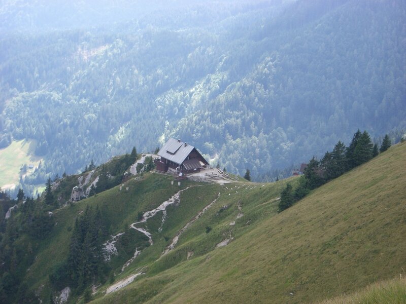 Mountain hut on a forested hill