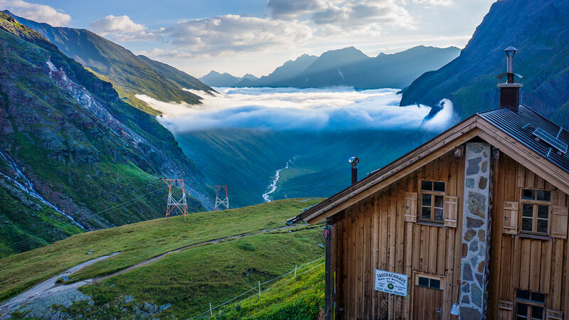 Mountain Hut with Clouds