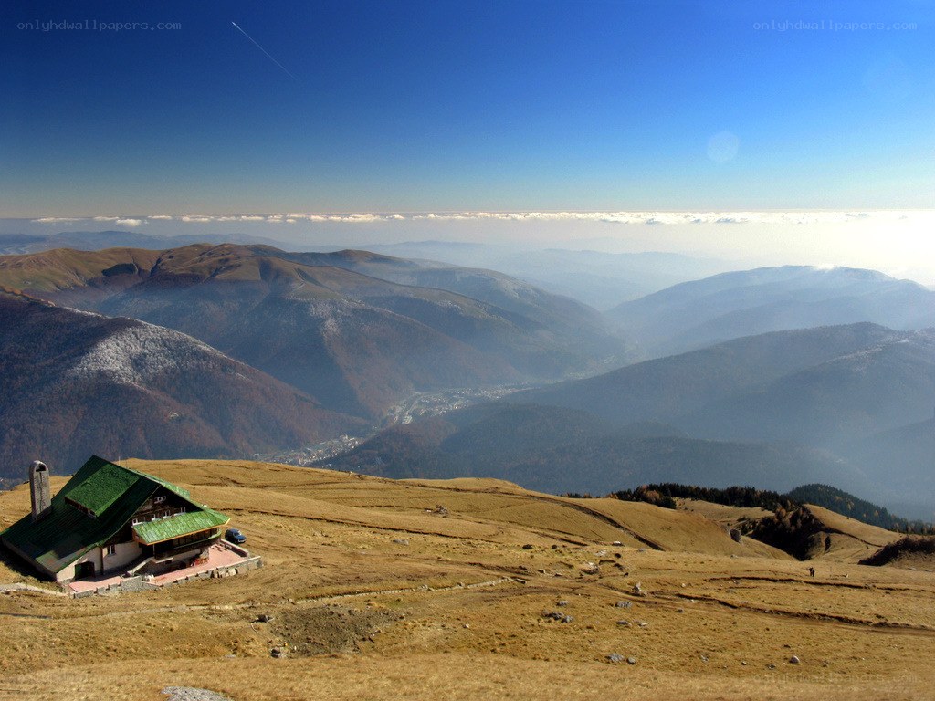 Mountain hut with valley view