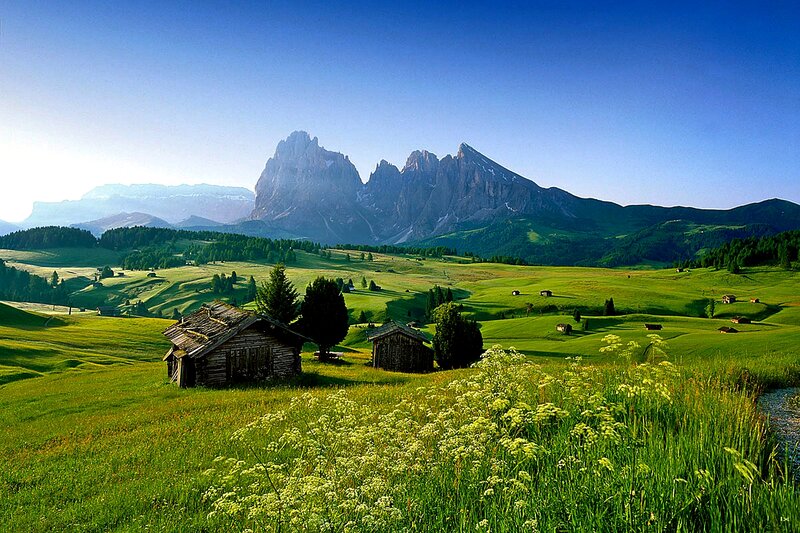 Mountain Huts in Valley — Green, Serene, Morning