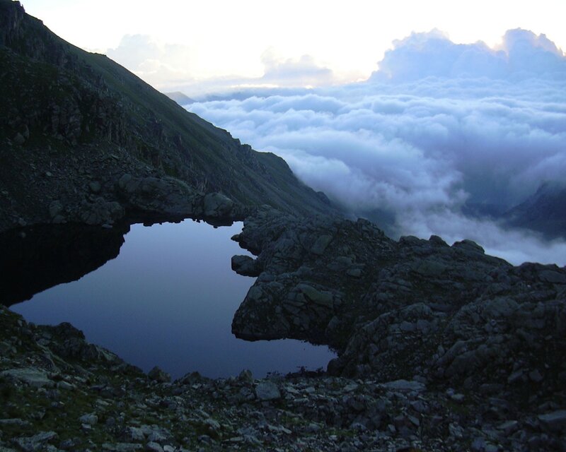 Mountain Lake Above Clouds