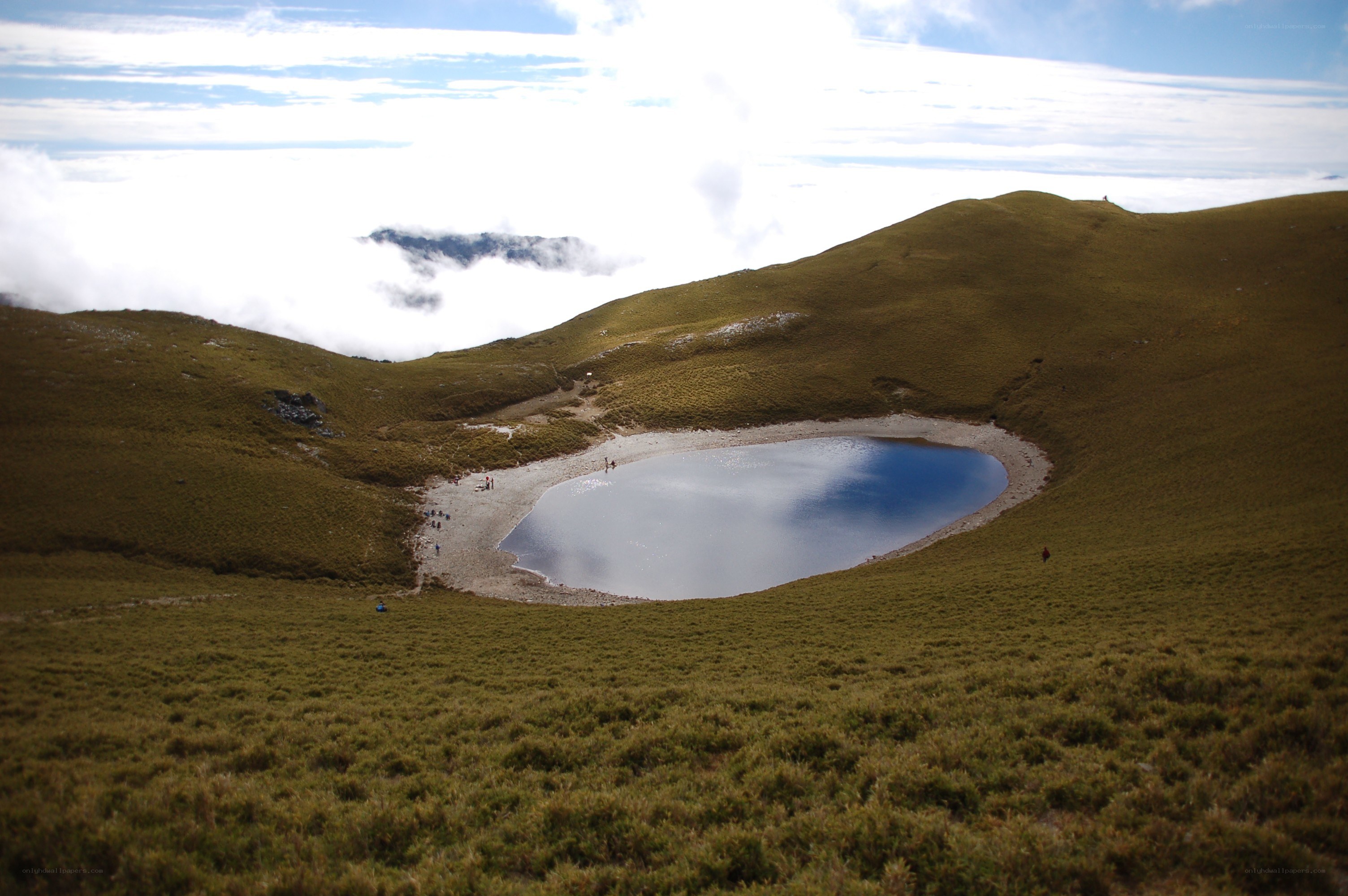 mountain lake above the clouds