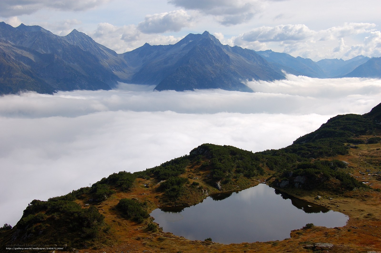 Mountain lake above the clouds