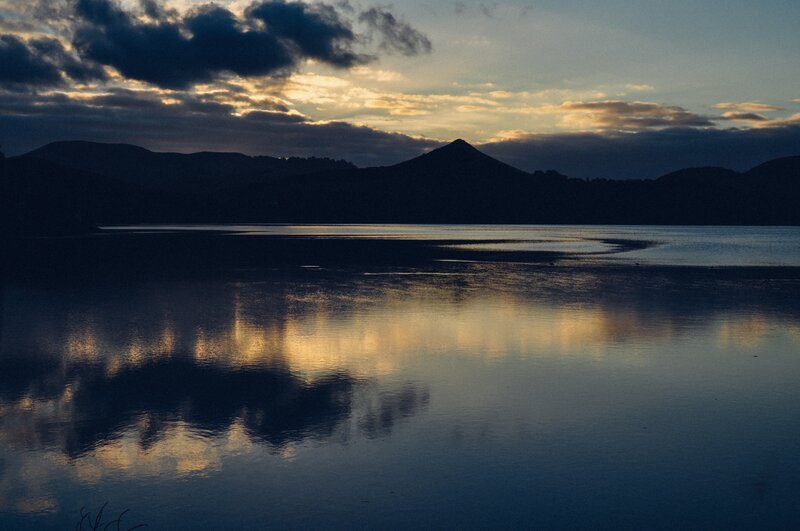Mountain Lake at Dusk — Blue, Serene, Sunset, Photograph, Mountains, Clouds, Reflection