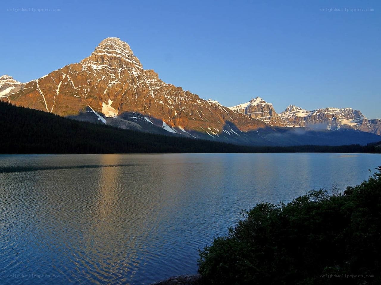 Mountain lake at sunrise