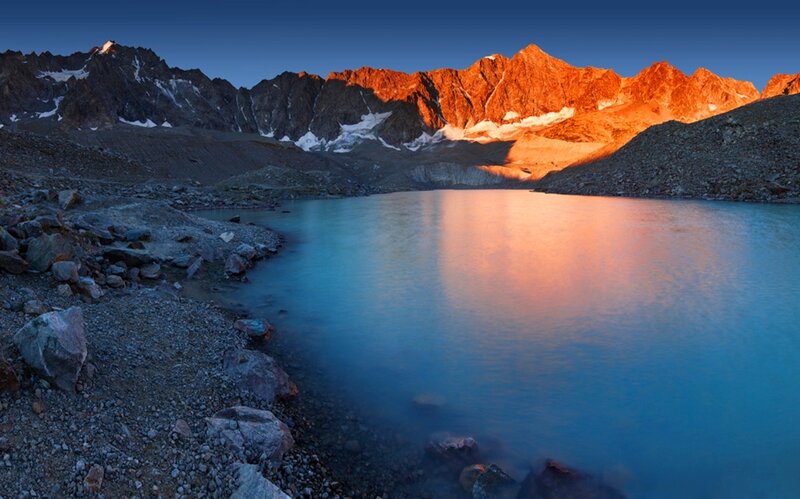 Mountain Lake at Sunrise — Blue, Serene, Photograph, Mountains, Rocks