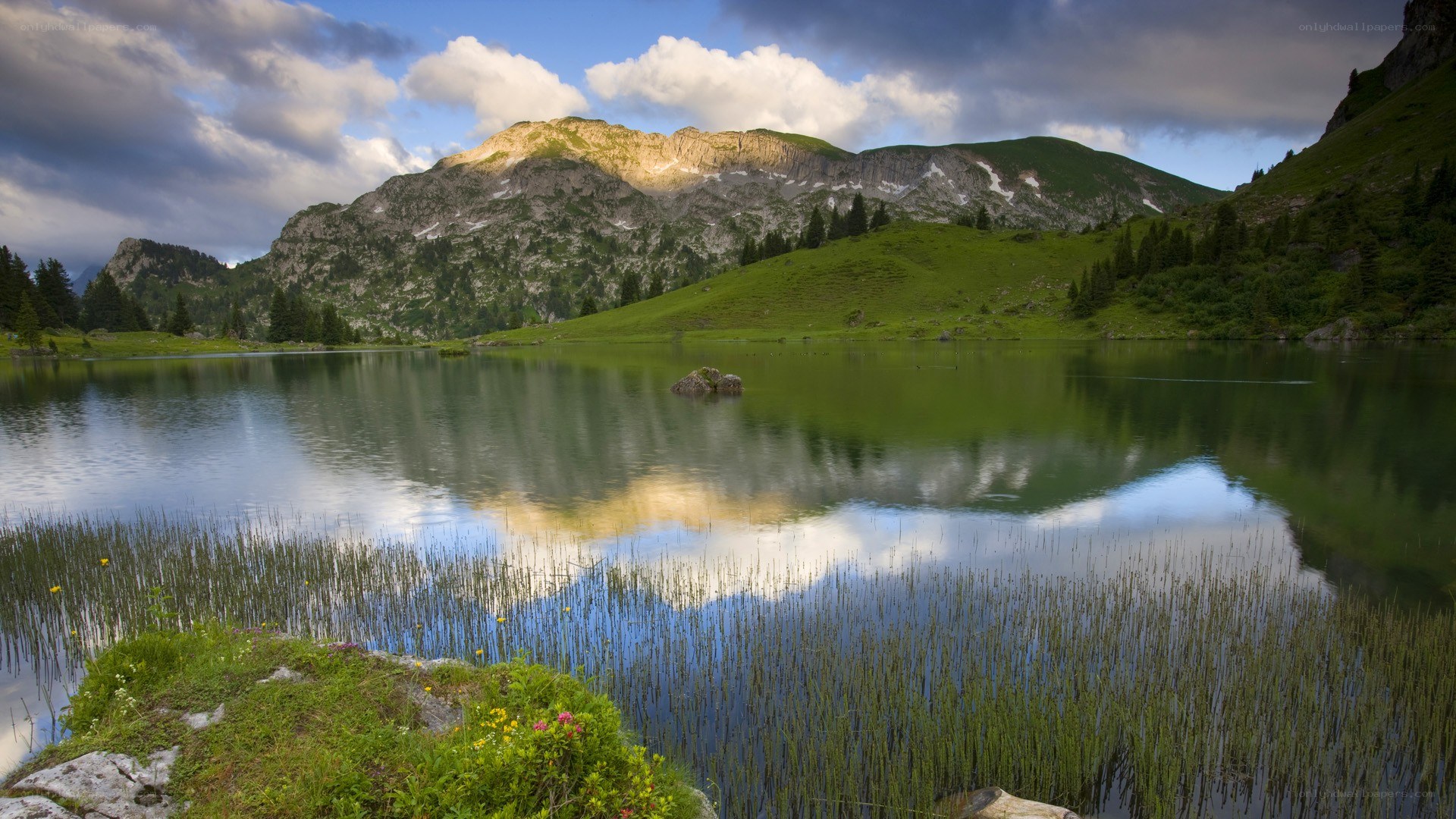 Mountain lake at sunset