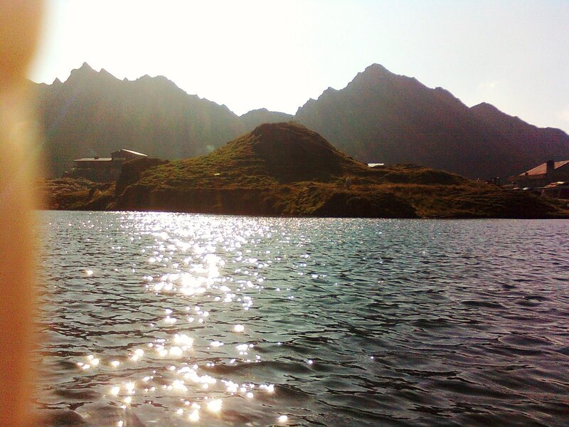 Mountain Lake at Sunset — Blue, Serene, Photograph, Mountains, Buildings