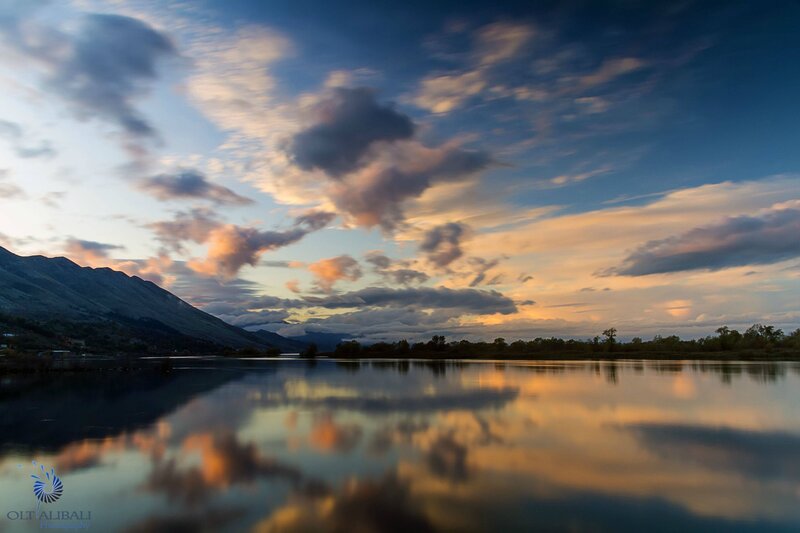 Mountain Lake at Sunset — Blue, Serene, Photograph, Mountains, Clouds, Trees