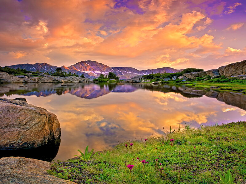 Mountain Lake at Sunset — Orange, Serene, Photograph, Mountains, Clouds, Flowers