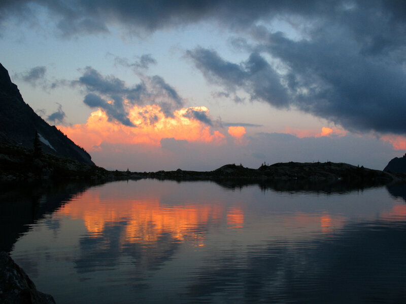 Mountain Lake at Sunset — Orange, Serene, Photograph, Mountains, Clouds, Reflection