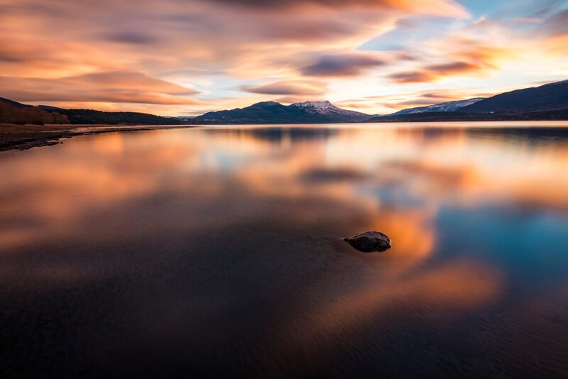Mountain Lake at Sunset — Orange, Serene, Photograph, Mountains, Clouds, Rock