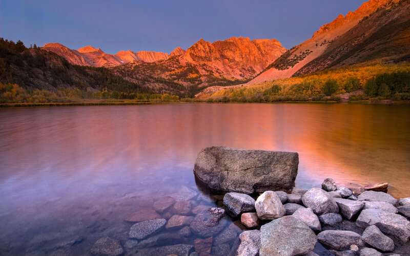 Mountain Lake at Sunset — Orange, Serene, Photograph, Mountains, Rocks, Trees