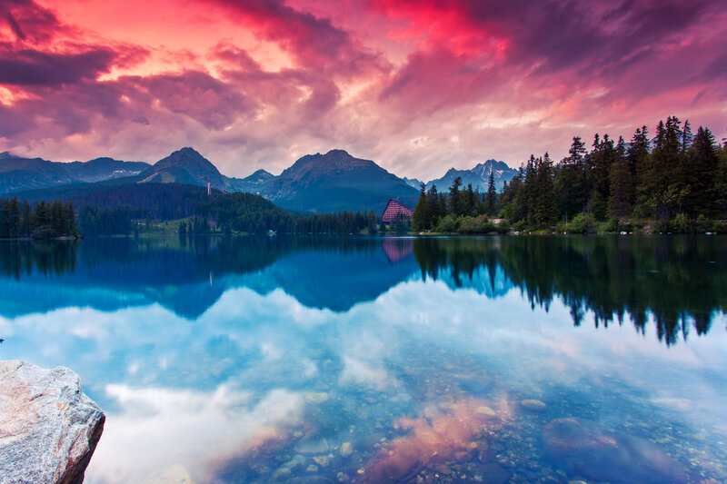Mountain Lake at Sunset — Red, Dramatic, Photograph, Mountains, Forest, Building