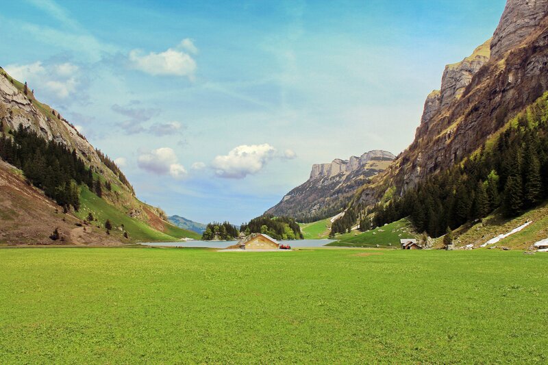 Mountain lake in a green valley