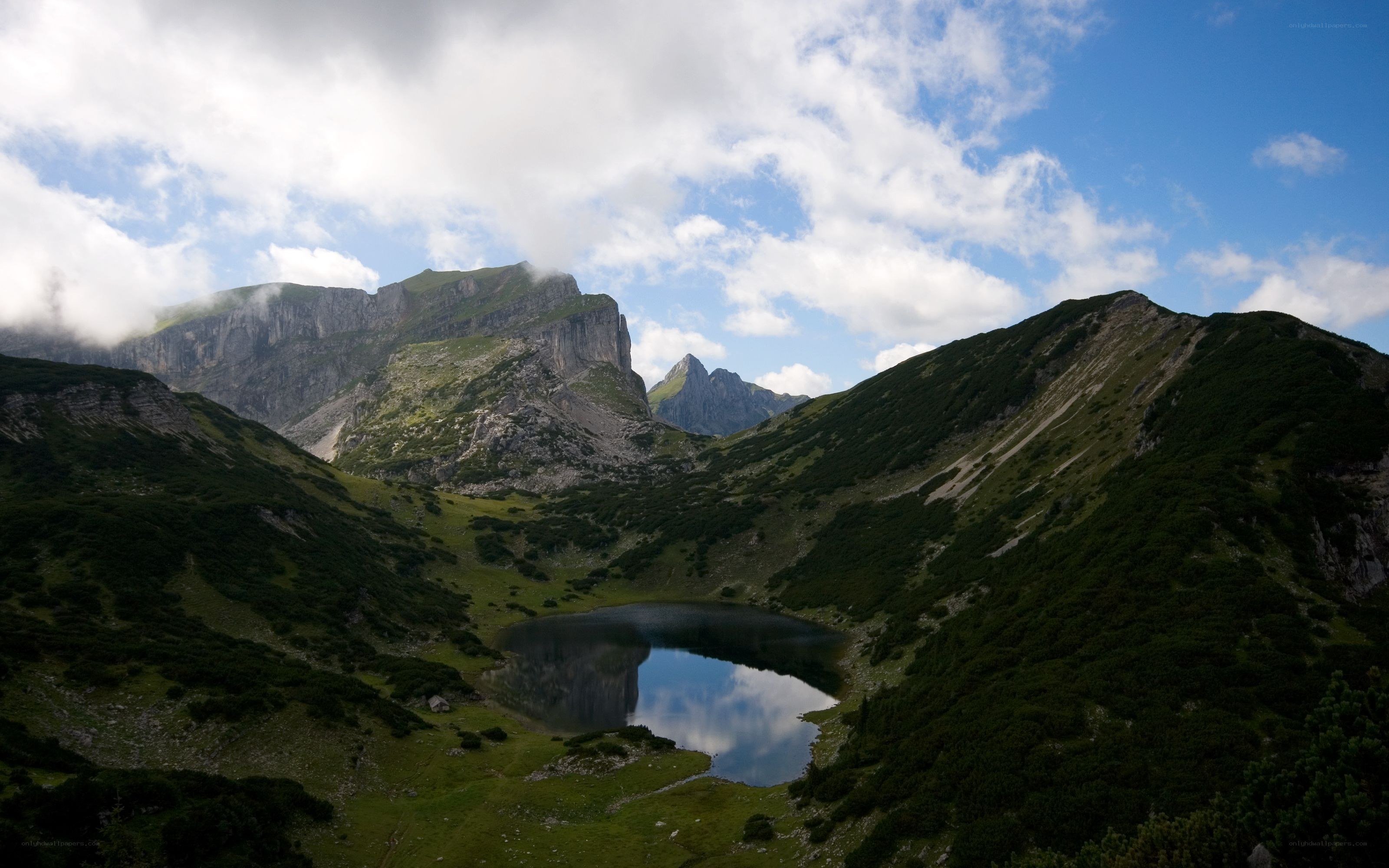 Mountain lake in alpine valley