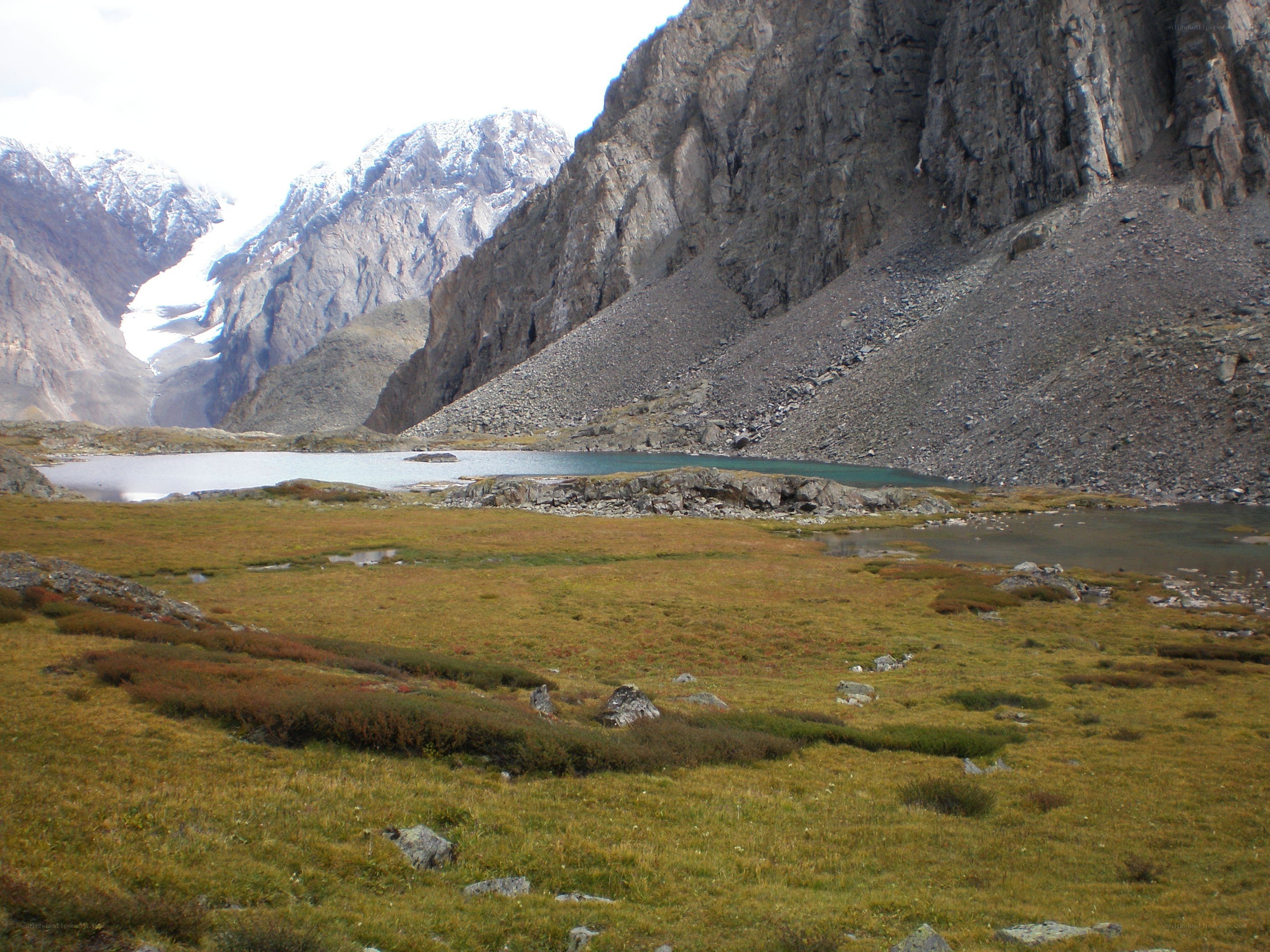 mountain lake in alpine valley