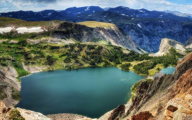 Mountain lake in alpine valley
