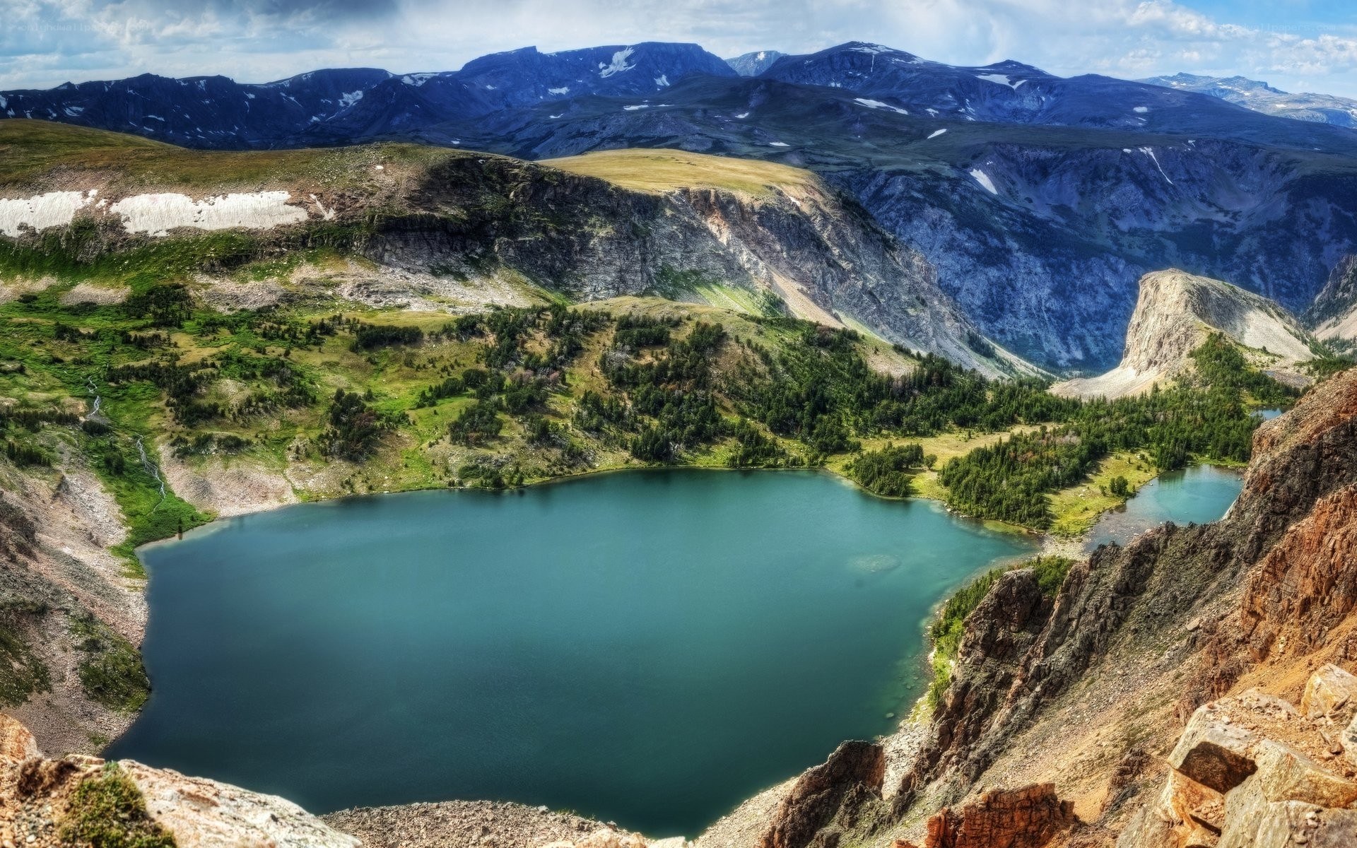 Mountain lake in alpine valley