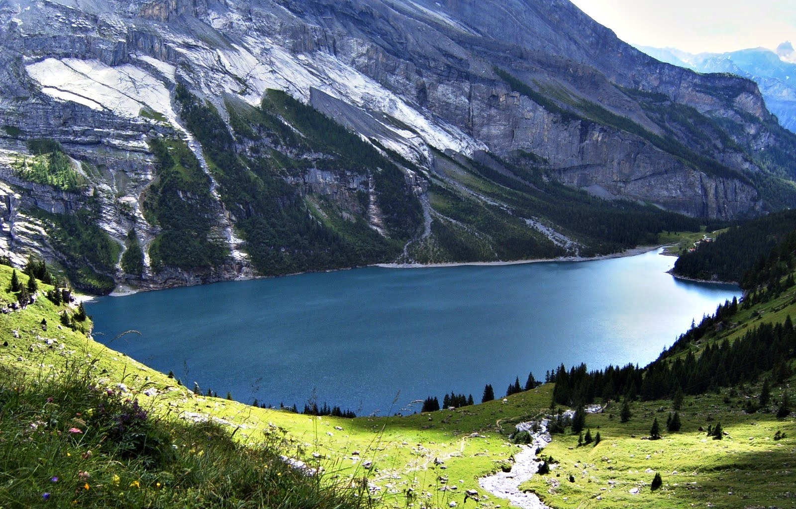Mountain lake in alpine valley