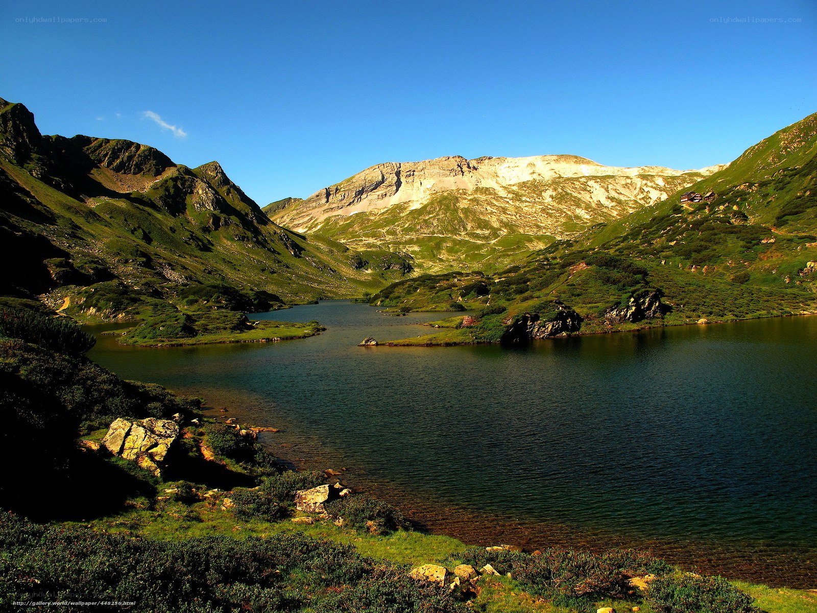 Mountain lake in alpine valley
