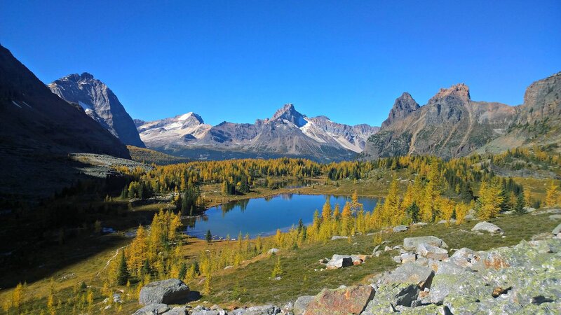 Mountain Lake in Autumn — Blue, Serene, Photograph, Trees, Mountains, Rocks