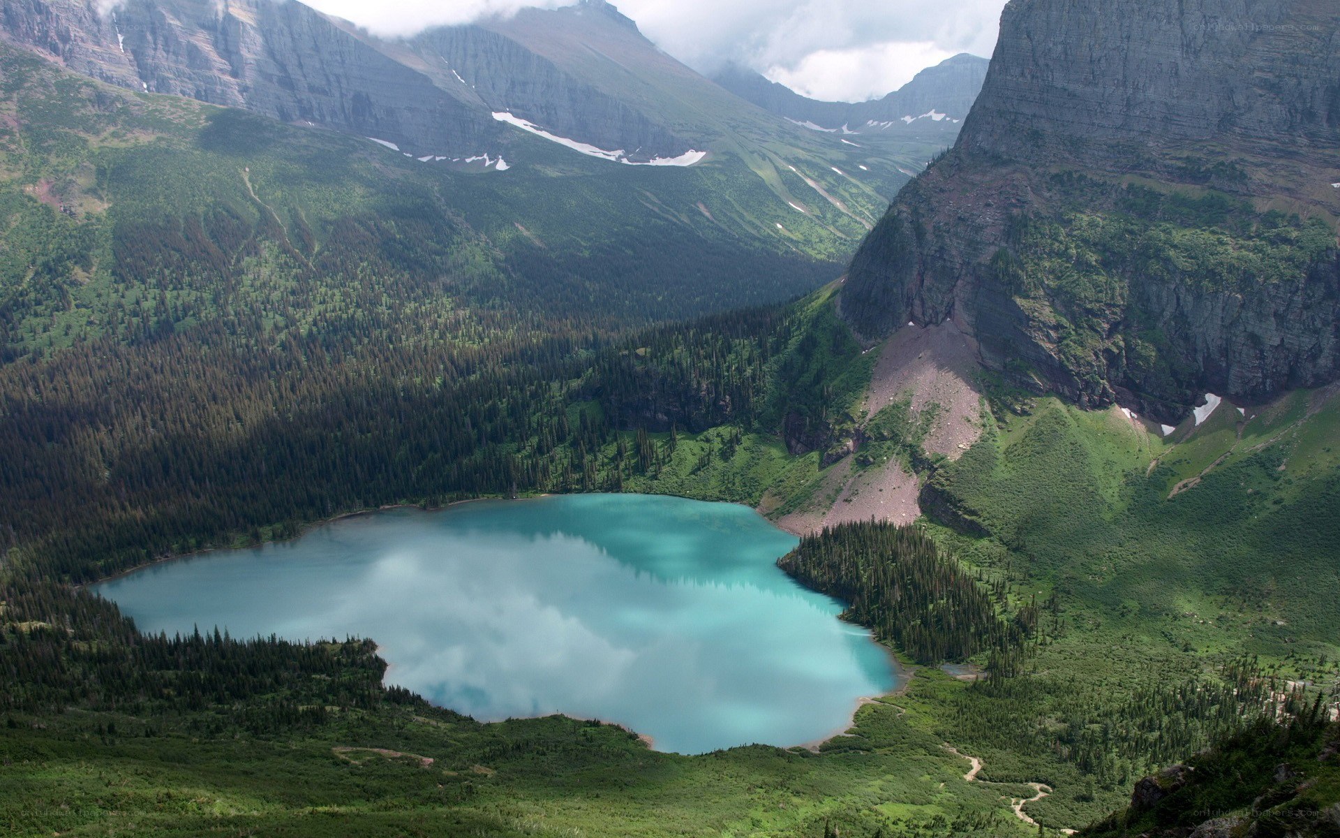 Mountain lake in forested valley