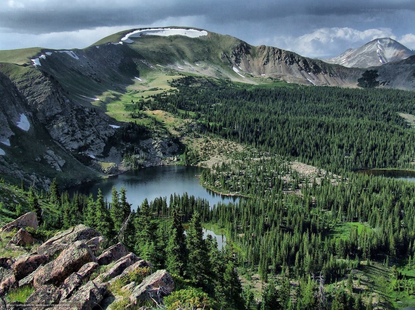 Mountain lake in forested valley