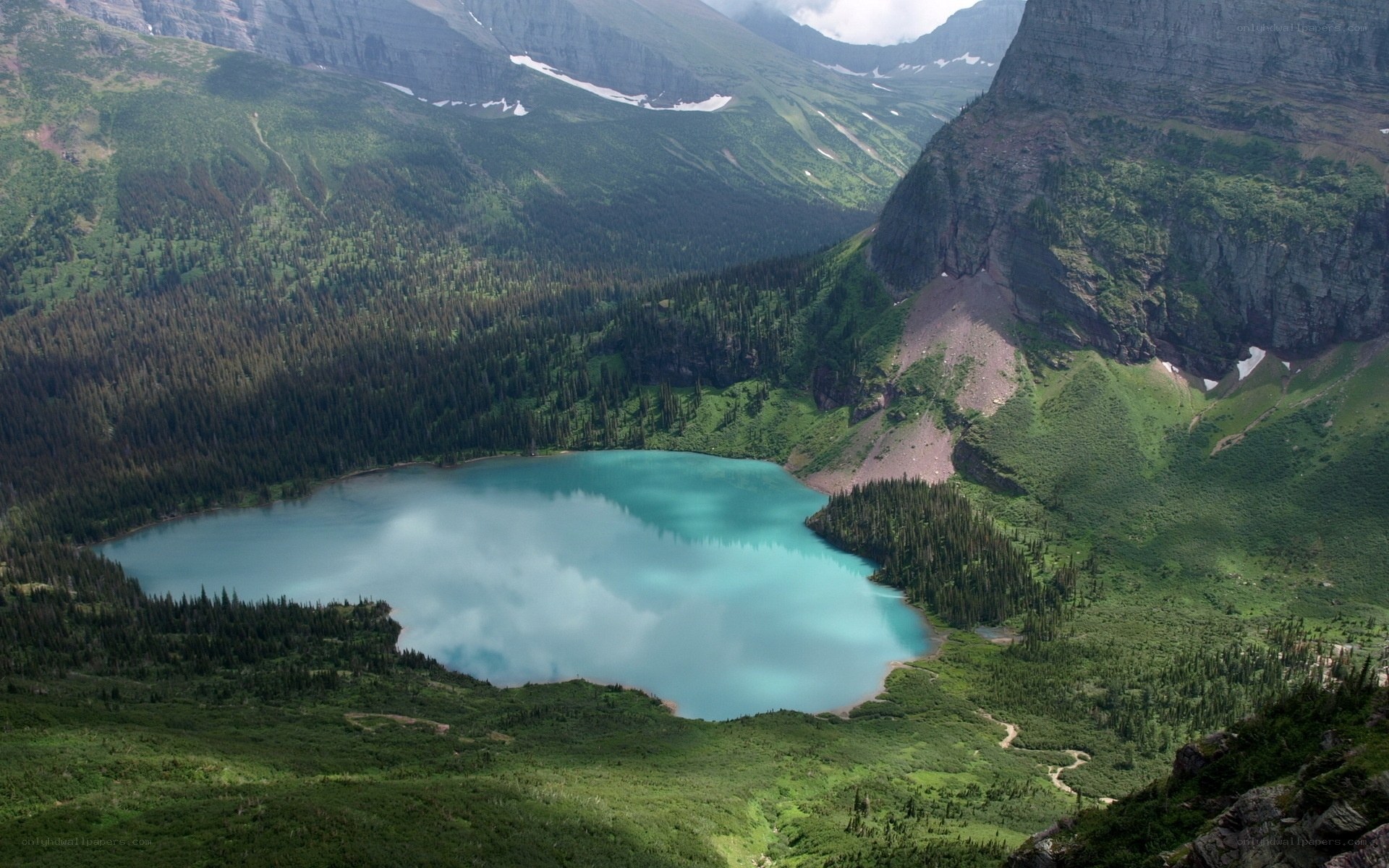 Mountain lake in forested valley