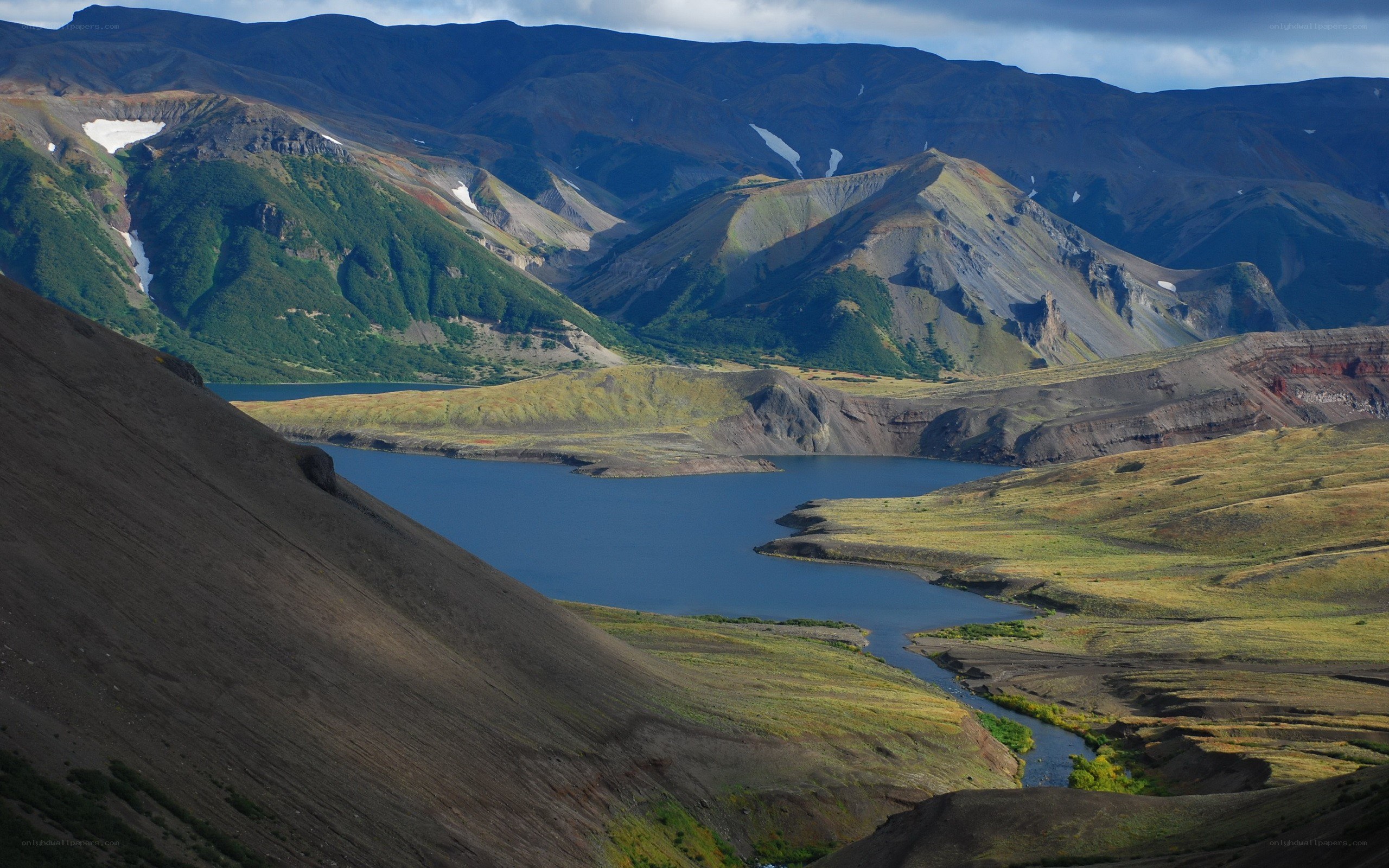 Mountain lake in volcanic landscape