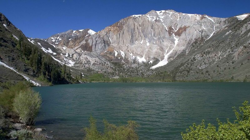 Mountain Lake Landscape — Blue, Serene, Afternoon, Photograph, Mountains, Snow, Trees, Green, Gray