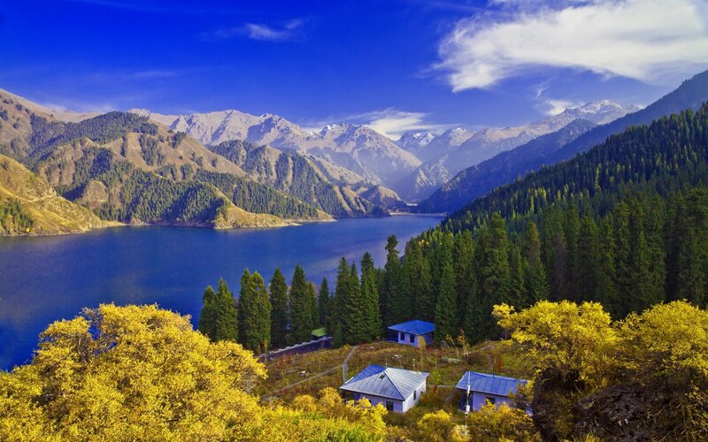 Mountain Lake Landscape — Blue, Serene, Autumn, Photograph, Mountains, Forest, Buildings