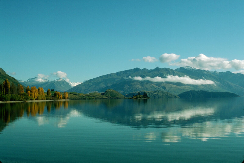 Mountain Lake Landscape — Blue, Serene, Autumn, Photograph, Mountains, Trees, Clouds