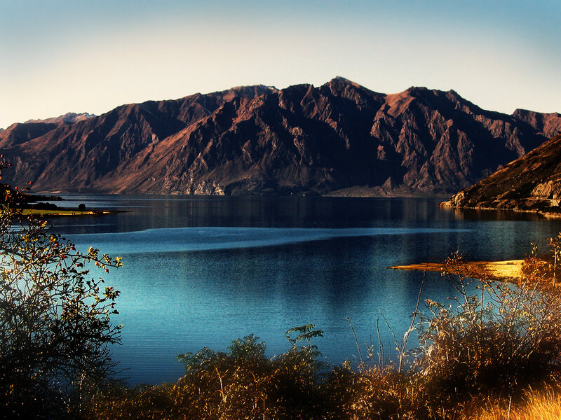 Mountain Lake Landscape — Blue, Serene, Sunset, Photograph, Mountains, Bushes